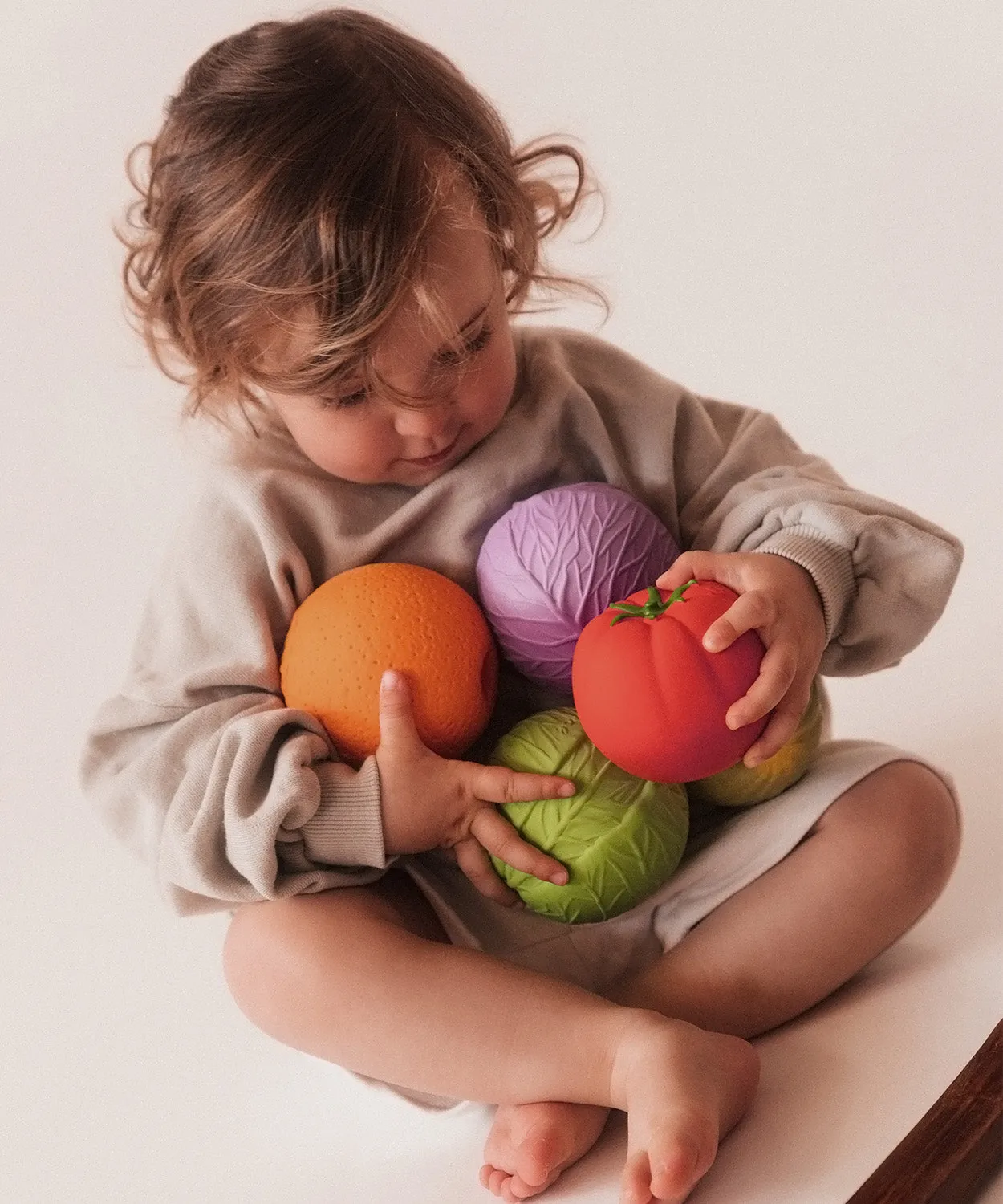 Oli & Carol Natural Rubber Baby Ball - Melon